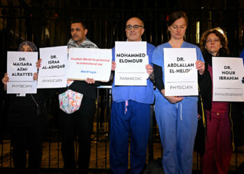 Demands for permanent Gaza ceasefire at British vigil for slain medical workers |  Israelo-Palestinian conflict