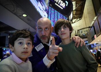 Dow Jones up sharply, Nasdaq down