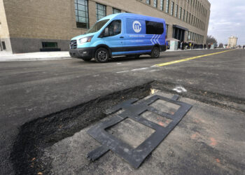 New technology installed under Detroit street can charge electric vehicles while they drive