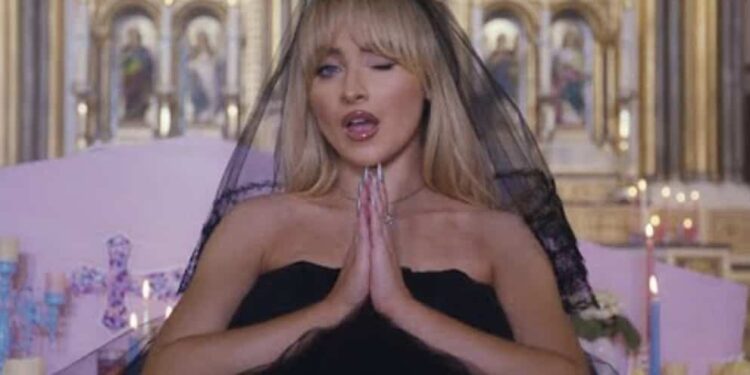 Provocative music video in a church: priest dismissed