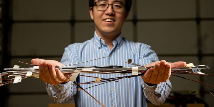 Adding a small amount of solid carbon to copper increases its conductivity