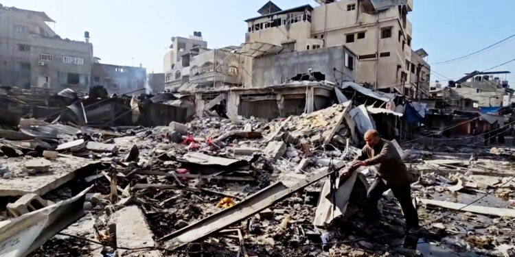 His shops were turned into rubble.. Occupation planes destroy Jabalia market  Programs