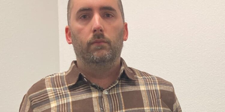 Substitute arrested after dropping pants in class