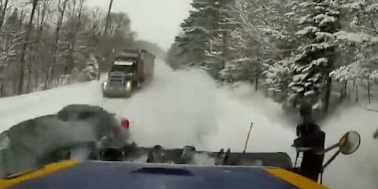 Driver hits snowplow while passing semi-trailer
