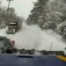 Driver hits snowplow while passing semi-trailer