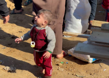 Families are forced to leave their tents near a hospital in the central Gaza Strip