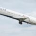 Man found dead inside Delta plane engine