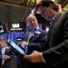 Wall Street weakens, weighed down by inflation