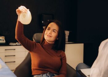her breast implant protected her from a bullet to the heart!
