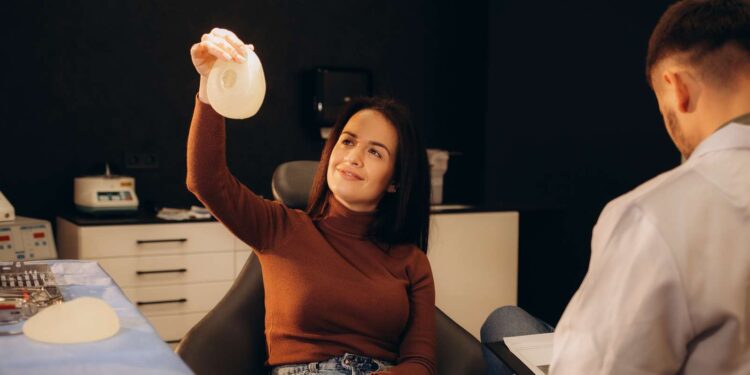 her breast implant protected her from a bullet to the heart!