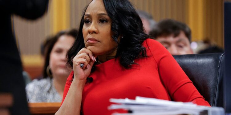 Judge in Trump trial in Georgia allows prosecutor to remain under conditions