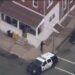 Three dead after gunfire near Philadelphia: gunman barricaded in residence