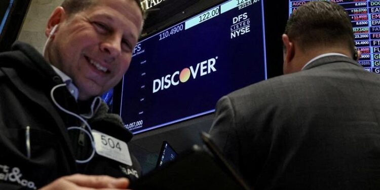 Wall Street climbs, boosted by Micron and the Fed