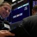 Wall Street climbs, boosted by Micron and the Fed