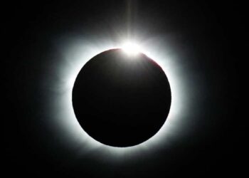 This former teacher reconnects with his students at a solar eclipse party