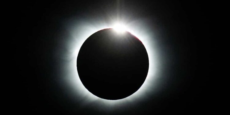 This former teacher reconnects with his students at a solar eclipse party