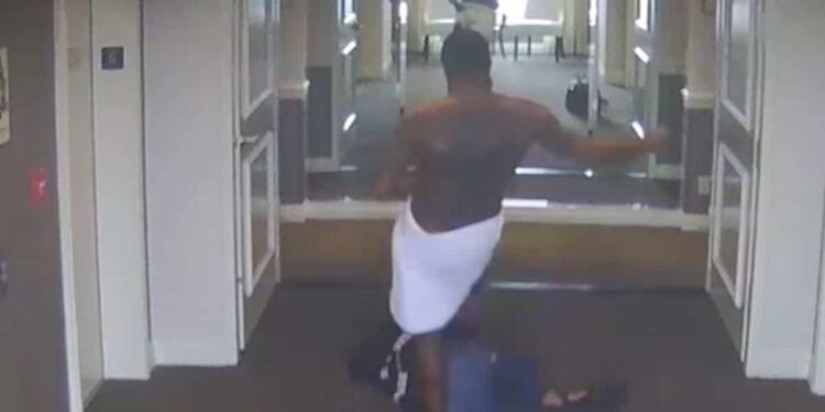 Puff Daddy filmed beating his partner