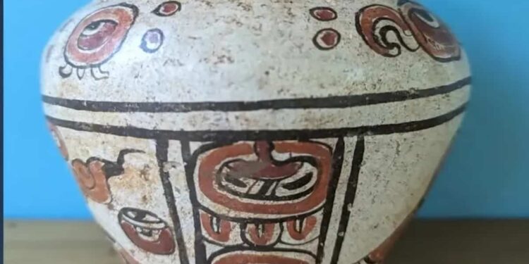 For $5, she buys a vase which is ultimately an artifact over 2000 years old.