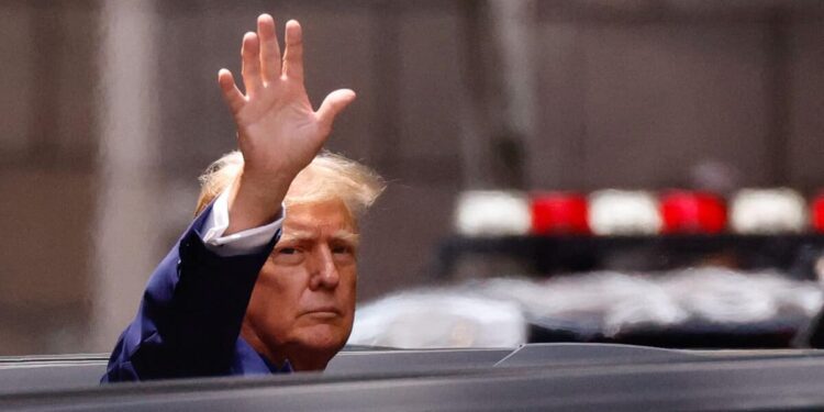 Georgia state justice suspends criminal proceedings against Trump