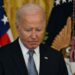 Tense national holiday for Biden, in the midst of a crisis over his candidacy