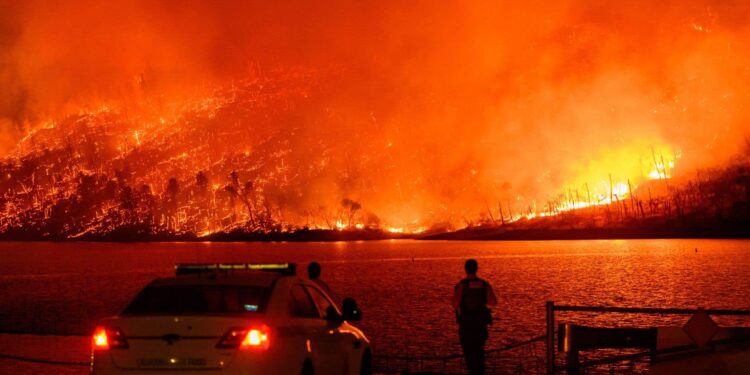 Thousands evacuated in California as wildfires spread