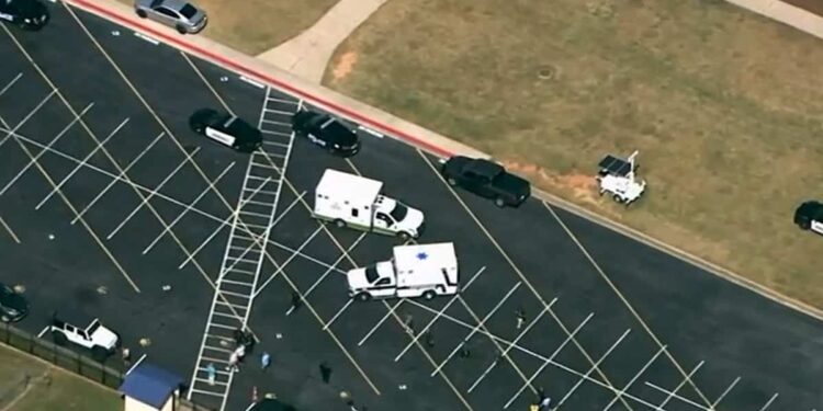 14-year-old shooter kills four at US high school