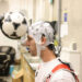Heading in football briefly slows brain activity, study finds