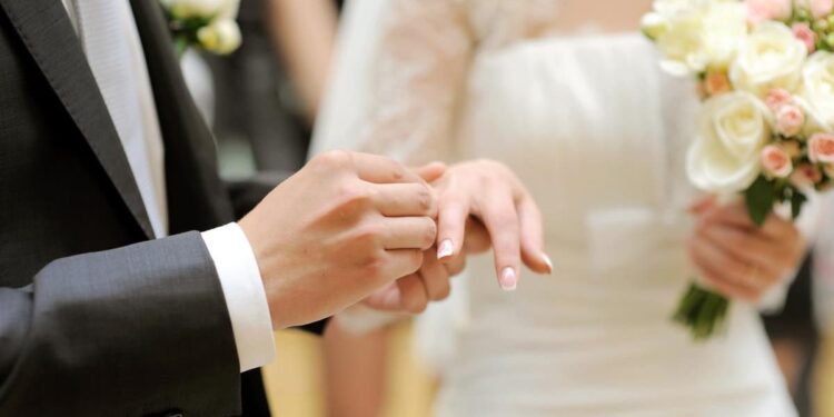 Two newlyweds charged with murder of best man