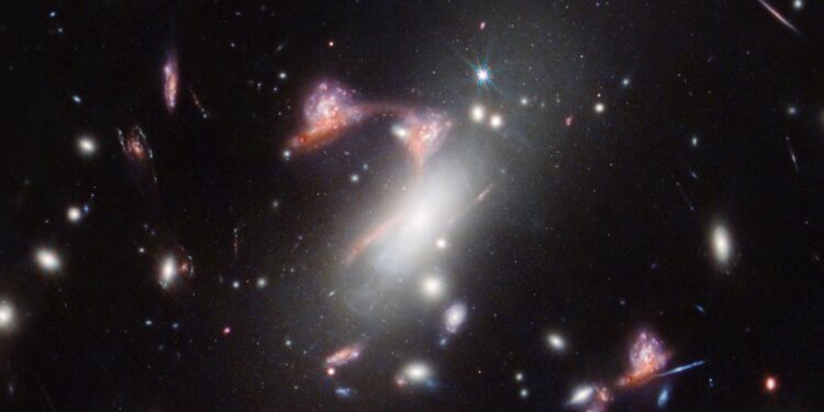 Webb Reveals Distorted Cosmic Question Mark About Galaxy Formation