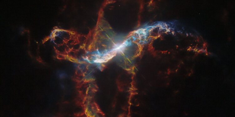 Hubble captures the intricacies of R Aquarii, a symbiotic binary star about 700 light-years from Earth