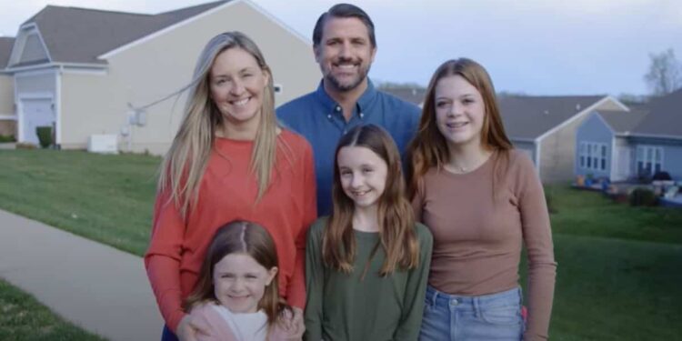 Republican poses with friend’s children and wife for his campaign