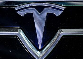Tesla surprises with a jump in profit