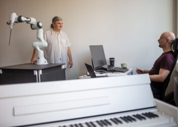Three-armed robot leads German orchestra