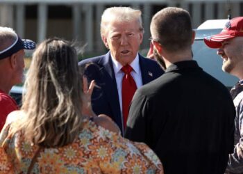 Trump and Harris stop in key state of Michigan