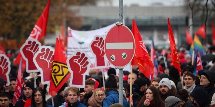 Volkswagen workers threaten to strike at the company’s factories in Germany economy