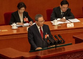 China sets an ambitious economic growth goal at 5% amid an escalation of trade tension with Washington economy