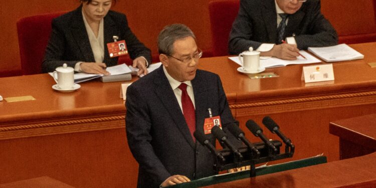 China sets an ambitious economic growth goal at 5% amid an escalation of trade tension with Washington economy