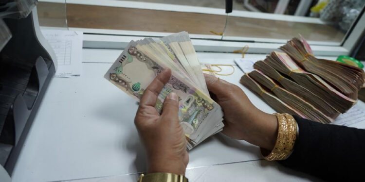 The stability of the Iraqi dinar exchange rate against the dollar today, Sunday economy