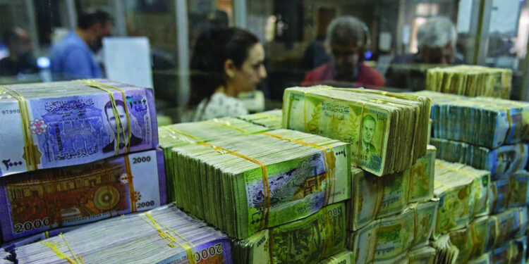 A rise in the exchange rate of the Syrian pound against the dollar today, Monday economy