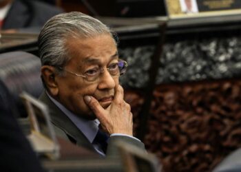 Mahathir: America behaves as an empire and its drawings will not stop China Economy news