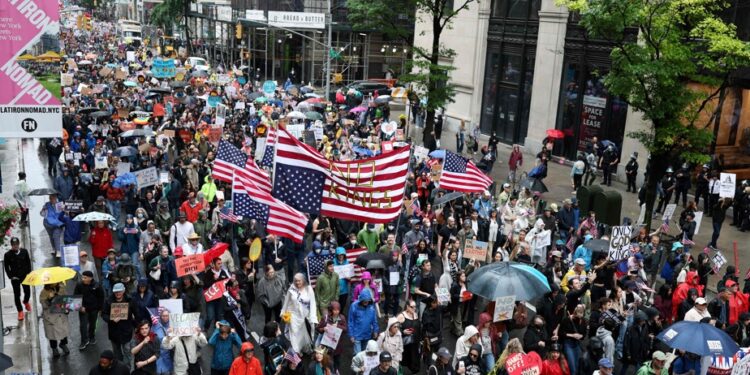 Protesters against Donald Trump gather across the country