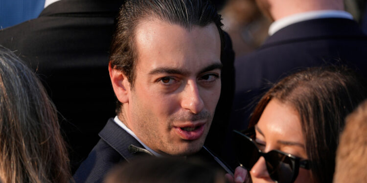 Trump’s pick for key post withdraws after racist messages spread